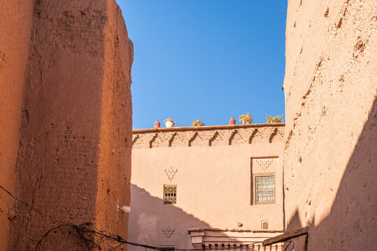 A kasbah of a semi deserted barbarian village in the atlas mountains surrounded by date palms along the road from marrakesh to the sahara desert