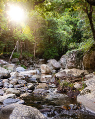 panorama of cedar creek swimming holes at sunset; a hidden stream with small pools near brisbane,...