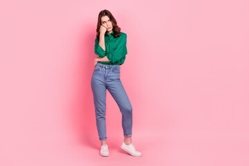 Full length photo of bored depressed lady dressed fist cheek looking emtpy space isolated pink color background