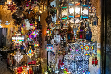 Fototapeta premium Colorful chandeliers for sale in a market in a souk in the Medina around the Jemaa el-Fnaa square in Marrakesh Morocco