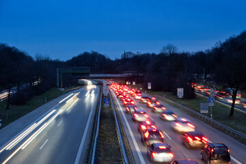 Germany, Bavaria, Long exposure of traffic jam on multiple lane highway at night