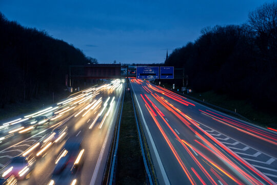 Germany, Bavaria, Long exposure of traffic on multiple lane highway at night