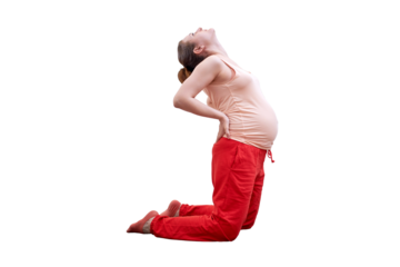 Pregnant woman does yoga at home and does exercises in the back band pose, isolated on a white background