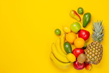 Healthy fruit food on yellow