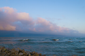Pink clouds over the sea