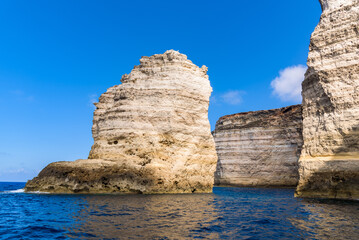 Limestone cliffs in the south coast of the island of Lampedusa, Sicily, Italy.