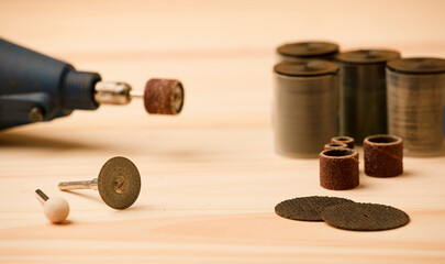 cutting disc and grinders with dremel machine, on work table