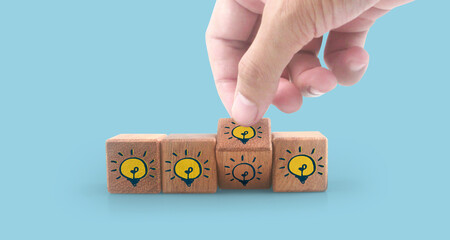 Wooden cubes in hand with copy space for input wording and infographic