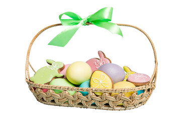 Fototapeta na wymiar Colorful easter cookies in basket with Multi colors Easter eggs isolated on white background. Pastel color Easter eggs. holiday concept