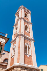 Fototapeta na wymiar The leaning bell tower of the church of San Giovanni Evangelista in the historic center of Ponsacco, Pisa, Italy