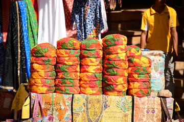 City street market with shops of Jaisalmer fort in Rajasthan, India, March 2023