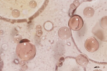 Fototapeta premium 3d render of beautiful pink droplets of face serum for your beauty project