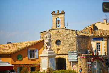Old medieval streets in famous village of Gordes in Provence, France