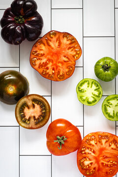 Fresch mix  tomatoes on white background.