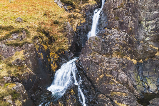 Stunning waterfall in Snowdonia National Park in Wales. Thundering waterfalls in national park in Britain. High quality photo