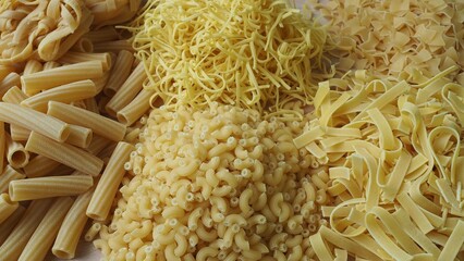Layout of Italian raw pasta, different types and shapes of pasta
