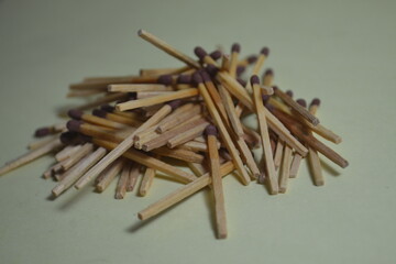 stacks of wooden matches strewn in a mountain range