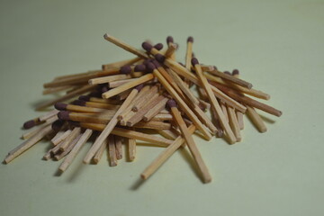 stacks of wooden matches strewn in a mountain range