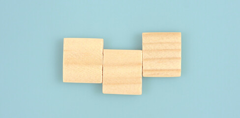 Wooden cube with the letter from word