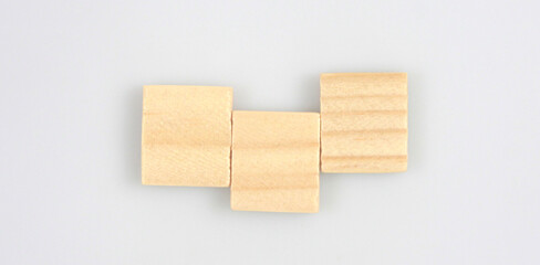 Wooden cube with the letter from word