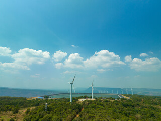 aerial view above a Group of Wind turbine on mountain at day time in Lam Takong Dam, Nakhon...