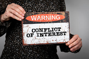 Conflict of Interest Concept. Warning sign with text