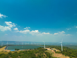 aerial view above a Group of Wind turbine on mountain at day time in Lam Takong Dam, Nakhon...