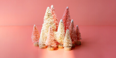 Bottle brush trees composition for winter holidays. Miniature artificial Christmas trees collection.