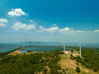aerial view above a Group of Wind turbine on mountain at day time in Lam Takong Dam, Nakhon...