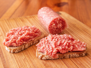 Savor a rustic German snack with Onion Mett served on bread