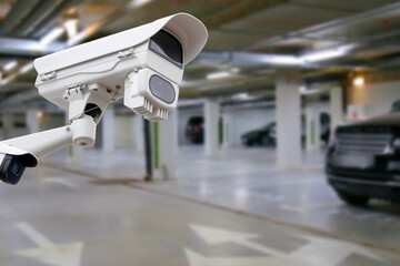 cctv camera installed on the parking lot to protection security. Copy space.