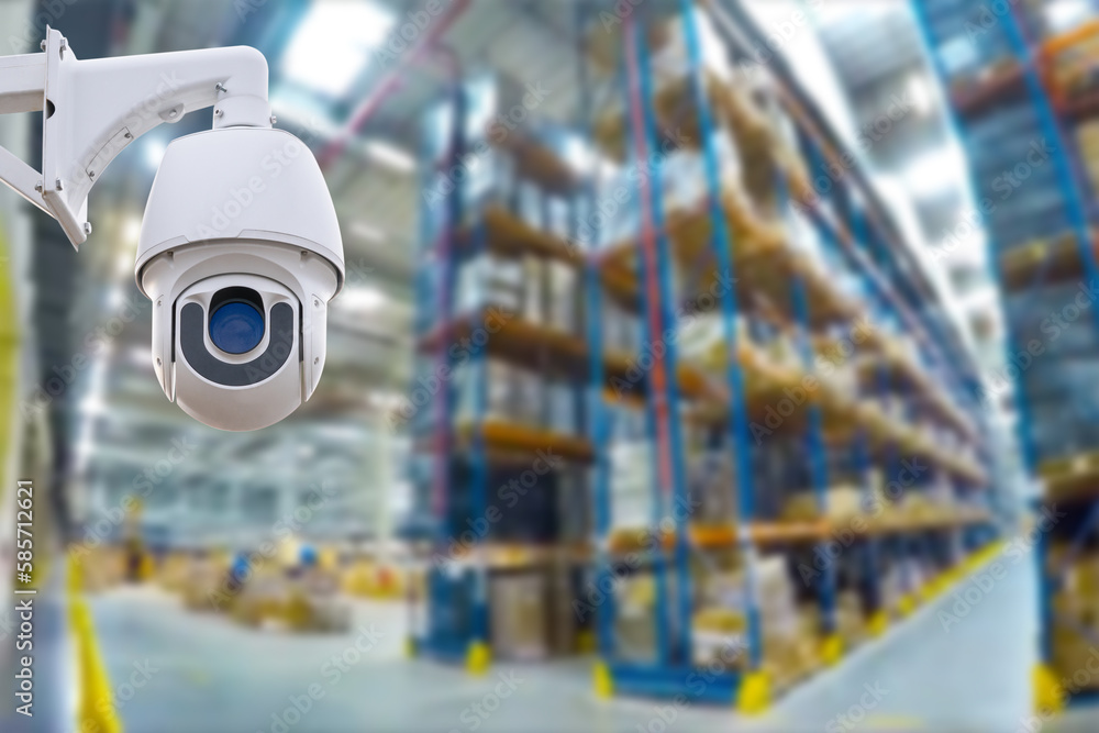 Poster closed circuit camera multi-angle cctv system against the background of a modern warehouse complex. 