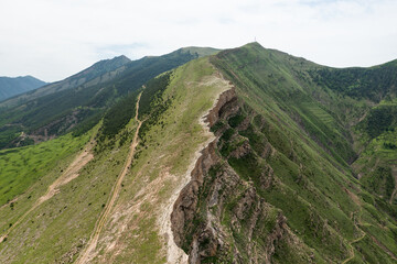 Above view of sharp cliff edge. Mountain nature of Dagestan Republic in Russia