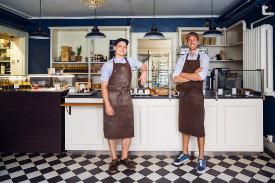 Portrait of young owners in bakery