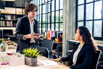 Group of business meeting and discussing strategy with startup project analysis finance,management.Success business people plan and brainstorm,marketing,idea,research,organization in office.Teamwork