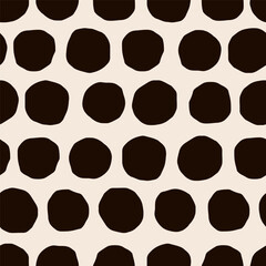 Vector seamless pattern with cutout circles. Hand drawn polka dot texture. Dotted background in retro style