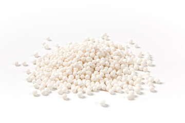 white sago pearls or sago balls isolated on white background. - obrazy, fototapety, plakaty