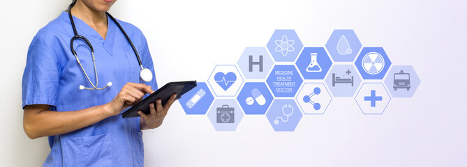Woman physical therapist in blue uniform holding tablet computer with research icons in modern...