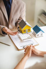 Real estate services for buying home holds house model and calculating table payment to customer.