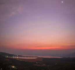 aerial view wind turbine viewpoint at Lamtakong dam,Nakhonratchasima, Thailand.
amazing sky of sunset above Lamtakong dam beautiful reflection on the large pond.
Gradient color. Sky texture, 
