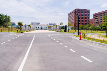 Empty asphalt road in a modern city.