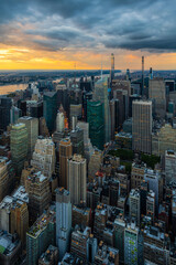 Fototapeta premium A rain storm over the midtown Manhattan in New York City during beautiful sunset.