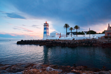Farol Museu de Santa Marta. Lighthouse and Museum in Cascais, Portugal. Beautiful sunset on the sea shore.