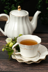 Pretty porcelain teacup with hibiscus tea