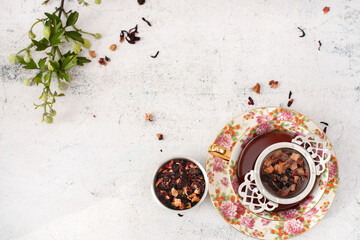 Pretty porcelain teacup with hibiscus tea