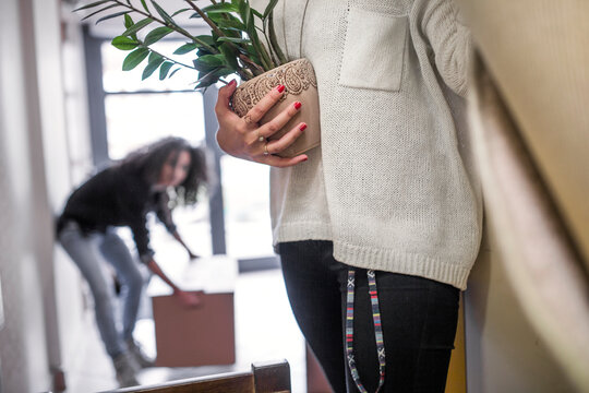 Two women moving house