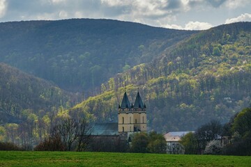Basilica Minor of Saint Benedict. Hronsky Benadik. Slovakia. Spring hike, green landscape.