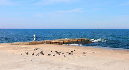 Fototapeta na wymiar View of a pier on a sunny day in Odessa, Ukraine
