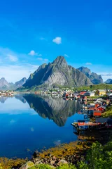 Abwaschbare Fototapete Nordeuropa Perfect reflection of the Reine village on the water of the fjord in the Lofoten Islands,  Norway