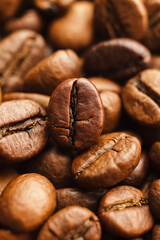 Roasted coffee beans background. Closeup